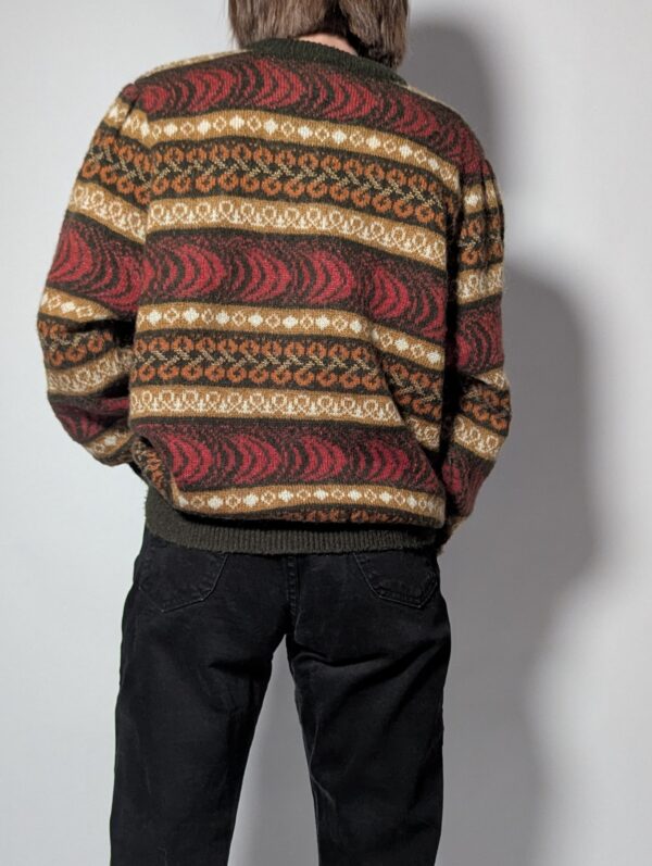 Vintage gebreid vest met warm patroon in aardetinten. Comfortabel en perfect voor herfstlooks.