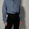 Vintage Hugo Boss blouse met subtiel blauw ruitpatroon. Tijdloos en verfijnd design.