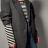 Vintage grijze blazer in charcoal tint. Tijdloos ontwerp en relaxed fit voor een moderne look.
