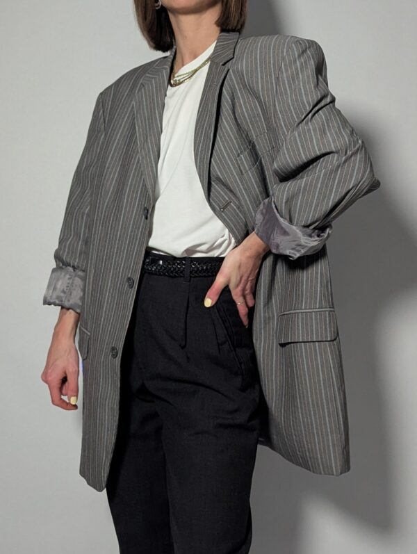 Vintage blazer in lichtgrijs met subtiele oranje streep