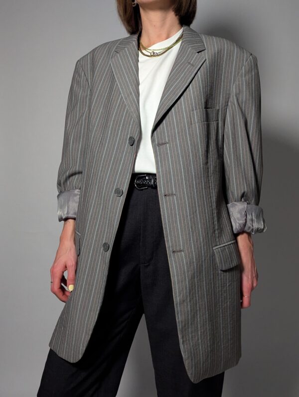 Vintage blazer in lichtgrijs met subtiele oranje streep