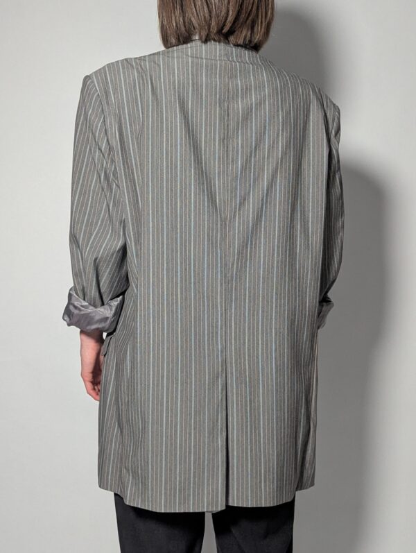 Vintage blazer in lichtgrijs met subtiele oranje streep