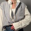 Vintage gestreepte blouse met contrasterende effen mouwen
