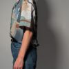 Vintage blouse met abstract patroon in blauw en beige tinten