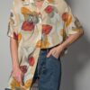 Amber breeze - 01 Vintage blouse met korte mouwen in beige met grote bloemenprint in amber, roest en zachte aardetinten.