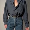 Vintage Hugo Boss blouse in blauwgrijze tint met lange mouwen, borstzak en relaxte pasvorm.