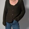 Vintage donkergroen grofgebreid vest met knoopsluiting, lange mouwen en oversized pasvorm.