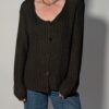 Vintage donkergroen grofgebreid vest met knoopsluiting, lange mouwen en oversized pasvorm.