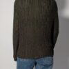 Vintage donkergroen grofgebreid vest met knoopsluiting, lange mouwen en oversized pasvorm.