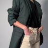 Vintage donkergroene blazer met rechte oversized pasvorm en klassieke tailored details.