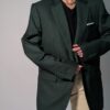 Vintage donkergroene blazer met rechte oversized pasvorm en klassieke tailored details.