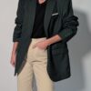 Vintage donkergroene blazer met rechte oversized pasvorm en klassieke tailored details.