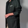 Vintage donkergroene blazer met rechte oversized pasvorm en klassieke tailored details.