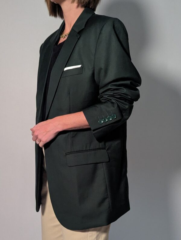 Vintage donkergroene blazer met rechte oversized pasvorm en klassieke tailored details.