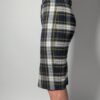 Midnight check-in 02 Vintage midi plaid rok in donkerblauw, grijs en crème met fijne gele lijnen en knoopsluiting aan de voorkant.