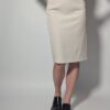 Soft skirt 01 Vintage kokerrok in zachte zandkleur met hoge taille en aansluitende midi lengte.