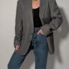 Steel line 02 Vintage grijze blazer met fijne krijtstreep, klassieke revers en rechte licht oversized pasvorm.