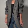 Steel line 04 Vintage grijze blazer met fijne krijtstreep, klassieke revers en rechte licht oversized pasvorm.