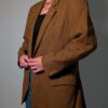 Burberry heritage 03 Vintage Burberry blazer in bruin en camel met fijne ruit, klassieke revers en rechte licht oversized pasvorm.