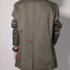 Olive tailor 03 Vintage olijfgrijze blazer met klassieke revers, lange rechte pasvorm en licht oversized silhouet.